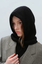 Black drawstring solid color thermal knit hat as balaclava in grey blazer