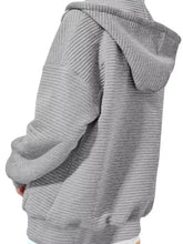 Gray ribbed corduroy drawstring zip up dropped shoulder hoodie with machine wash care instructions visible