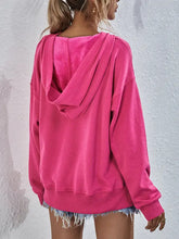 Women’s hot pink dropped shoulder slit hoodie with long sleeve length