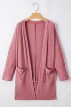 Dusty rose ribbed cardigan with textured pockets and open front