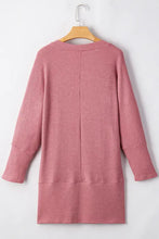 Dusty rose waffle-knit cardigan with long sleeves, round neckline, pockets, and open front