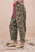 BiBi braided waist belt camouflage print pants with relaxed fit denim fabric, pink drawstring waistband, and patch pockets