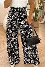 Black and white floral print size printed high waist wide leg pants with ruffled waistband for stylish comfort