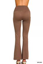 Brown high-waisted flare pants made from brushed dty microfiber offering a comfortable and stylish fit