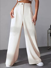 Cream-colored wide leg pleated pants with high waist satin finish and single button closure for elegant wear