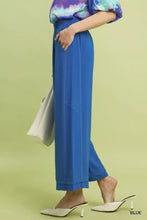 Blue linen elastic waist wide leg pants with subtle white stitching and a relaxed tapered fit by umgee linen elastic waist