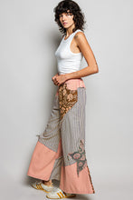 Patchwork wide-leg pants in pink brown floral and striped fabric with partial elastic and side big star patch