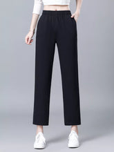 Black high-waisted wide-leg trousers with elastic waist loose fit designed for comfort and style