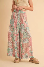 Aemi co printed wide leg pants in soft pink and mint green patchwork with delicate floral pattern