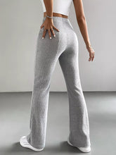 Gray ribbed knit high waist flare pants showcasing a stylish high waist flare design and comfortable fit