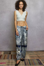 Blue and white floral printed woven wide leg silk pants with tie waist from POL for comfortable stylish wear