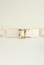 Cream-colored elastic belt with multicolored leaf buckle and gemstone detailing