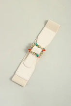 White elastic belt with multicolored leaf buckle and beaded heart design