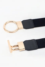 Black and gold woven elastic belt with circle shape buckle and PU leather trim