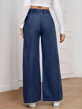 Blue denim wide leg jeans featuring an elastic waist wide band for comfortable casual wear