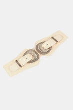 Cream-colored elastic wide belt with silver accents and shell double buckle