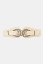 Cream-colored elastic wide belt with ornate shell double buckle