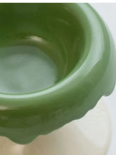 Elevated ceramic pet bowl in smooth glossy jade-green with scalloped rim