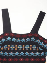 Embroidered black maxi dress with colorful floral bodice and thin straps