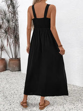 Black sleeveless embroidered maxi dress with colorful bodice
