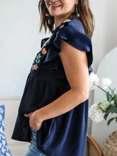 Navy blue embroidered floral ruffle sleeve blouse with colorful floral embroidery on shoulder and neckline