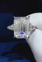Emerald cut carat moissanite sterling silver ring with baguette side stones