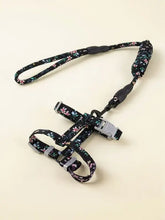 Escape proof cat harness with black floral pattern, silver buckles and leash