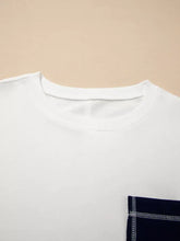 White cotton t-shirt with navy blue patch pocket and exposed seam detail suitable for machine wash cold care