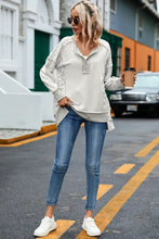 Exposed seam leopard long sleeve sweatshirt with lace henley details