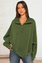 Oversized olive green exposed seam sweatshirt with slit long sleeve and studded collar