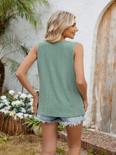 A mint green eyelet cutout round neck tank with a sleeveless design, delicate eyelet knit, and frayed hem