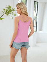 Pink knitted eyelet double strap cami tank top with crisscross back straps showing back side design