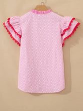 Pink flutter sleeve blouse with eyelet embroidered white dots and red lace trim on sleeves and neckline