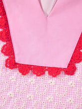 Pink v-neck eyelet embroidered flutter sleeve blouse with red lace trim and flower texture contrast detailing