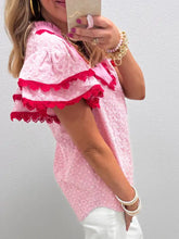 Pink eyelet embroidered flutter sleeve blouse with lace trim and subtle flower texture pattern on lace-trimmed sleeves
