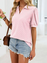Pink short-sleeved eyelet johnny collar top with subtle diamond pattern and puff sleeves for stylish wear