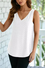 White sleeveless eyelet knit patterned loose v neck tank top with intricate embroidery for casual wear