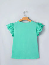 A mint green eyelet lace ruffled cap sleeve top with delicate flutter lace detailing for a feminine look
