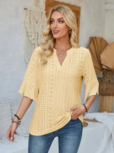 Light yellow eyelet notched half sleeve V-neck top
