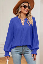Women’s royal blue eyelet notched long sleeve V-neck blouse