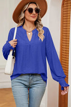 Women’s royal blue eyelet notched long sleeve blouse with V-neck