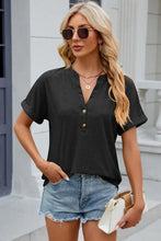 Women’s black eyelet notched short sleeve V-neck top with gold buttons