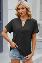 Eyelet notched short sleeve black V-neck blouse with denim shorts