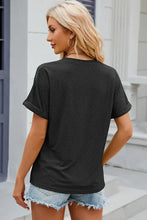 Women’s eyelet notched short sleeve black t-shirt with rolled cuffs