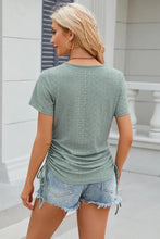 Light green eyelet round neck short sleeve t-shirt with side ruching