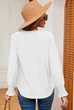 Women’s white eyelet long-sleeve flounce sleeve blouse with ruffled cuffs