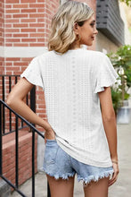 White eyelet V-neck top with flutter sleeves
