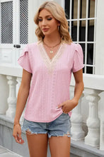 Women’s pink eyelet short-sleeve top with cream lace V-neck and petal sleeves