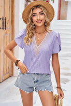 Women’s lavender eyelet V-neck top with short petal sleeves
