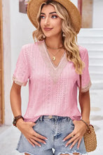 Women’s pink eyelet embroidered V-neck short sleeve top